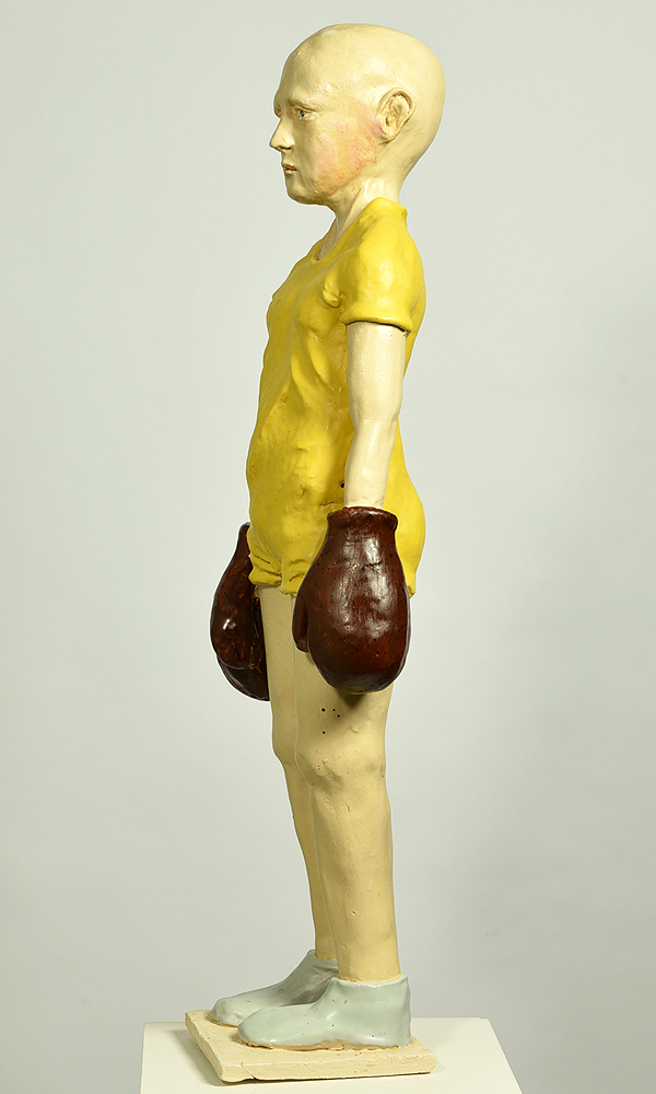 Junge mit Boxhandschuhen